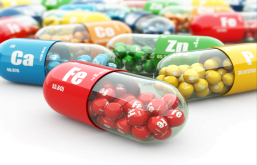 imagem de varias capsulas de remédios de cores variadas.
